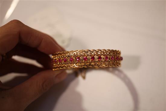 A Middle Eastern 18ct gold and ruby bracelet,